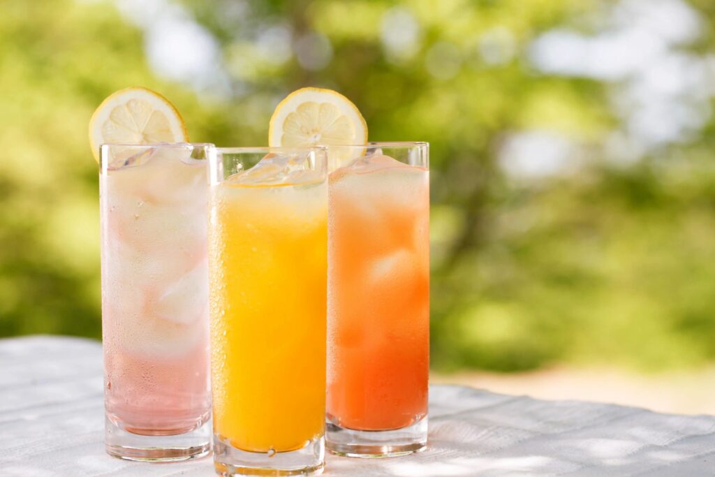 Fruit cocktails on a table outside