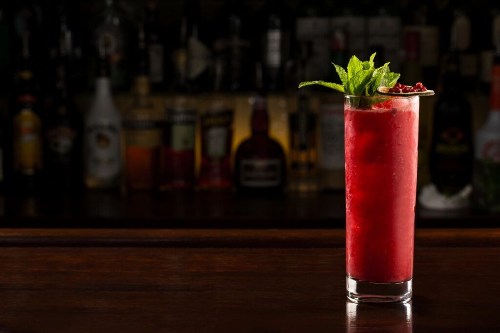 Cocktail on a table with dark background