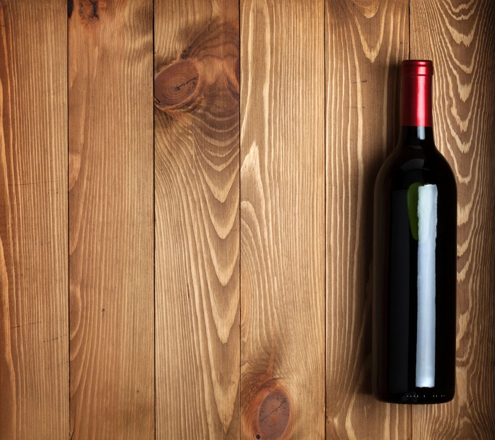 Bottle of wine on a wood table